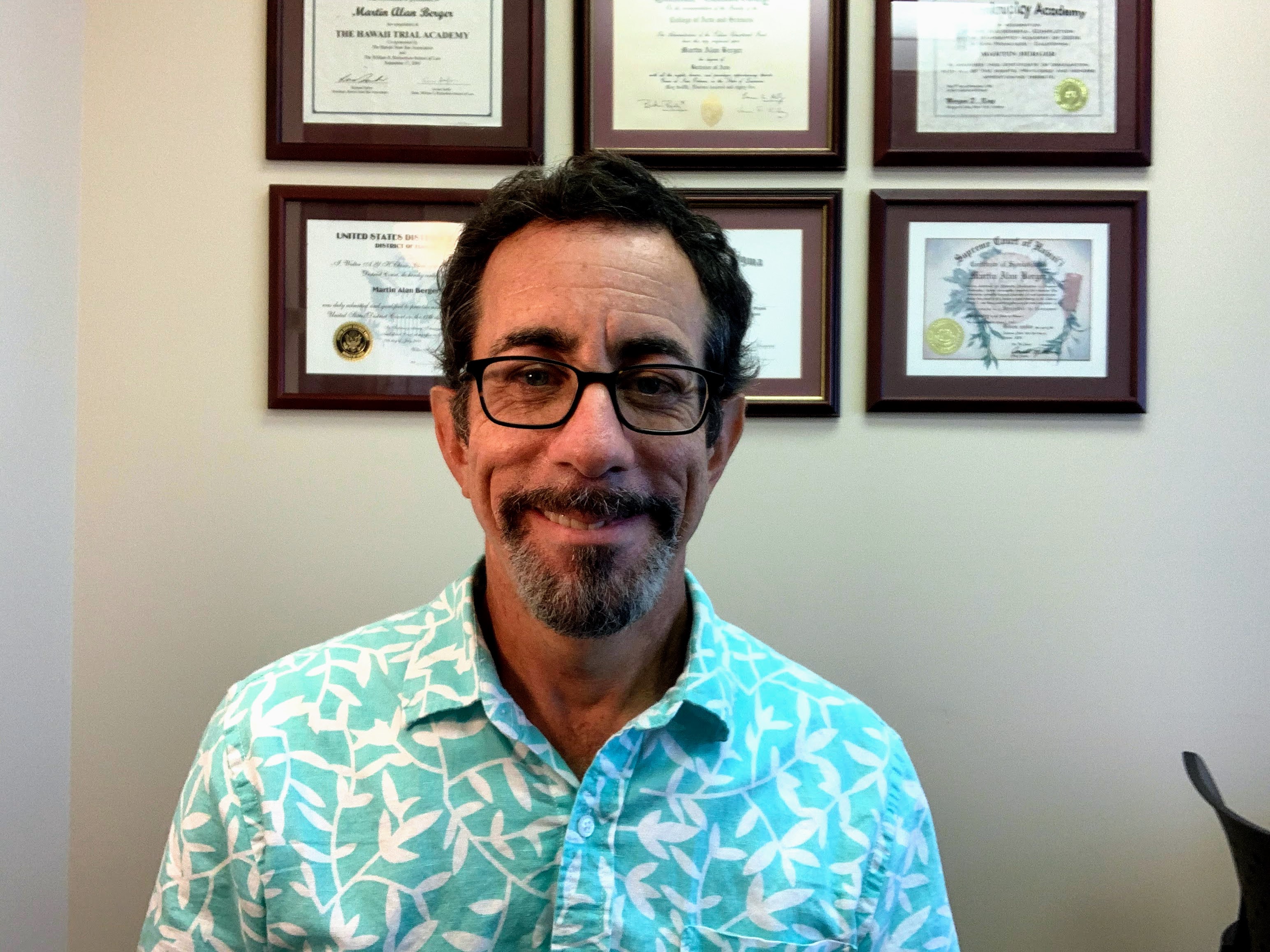 Photo of Marty Berger in his office in downtown Honolulu